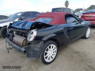 2001 Toyota MR2 Spyder with VIN JTDFR320710035330, listed as a IAAI auction lot 41238516 with 160,405 mi miles. Bid and sale history available at carsss.com. Image 4.