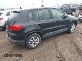 2012 Volkswagen Tiguan SE with VIN WVGAV7AX7CW609609, listed as a IAAI auction lot 41947280 with 77,942 mi miles and . Bid and sale history available at DreamBid. Image 4.