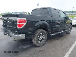 2014 Ford F-150 XL with VIN 1FTFW1EF3EKF83235, listed as a IAAI auction lot 42220986 with 114,384 mi miles and . Bid and sale history available at DreamBid. Image 4.