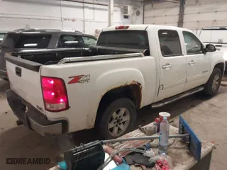 2010 GMC Sierra 1500 SLE with VIN 3GTRKVE32AG167135, listed as a IAAI auction lot 41733354 with NaN miles. Bid and sale history available at carsss.com. Image 4.