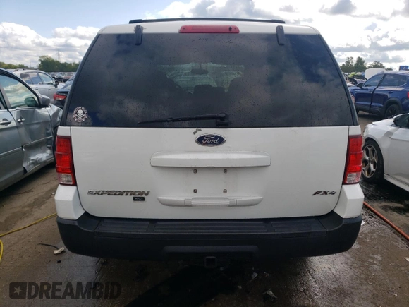 2003 Ford Expedition Special Service z VIN 1FMPU16L63LC45698, wystawiony jako Copart lot #70058684 z przebiegiem 163 798 mil mil oraz Szkoda całkowita • Salvage title. Historia ofert i sprzedaży dostępna na DreamBid. Obrazek 6.