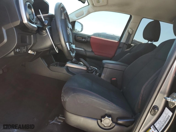 2018 Toyota Tacoma SR5 with VIN 3TMAZ5CNXJM057187, listed as a Copart auction lot 48705665 with 120,057 mi miles and Salvage Title. Bid and sale history available at carsss.com. Image 7.