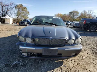2004 Jaguar XJ with VIN SAJWA73B64TG28182, listed as a Copart auction lot 78380674 with 0 mi miles and Salvage Title. Bid and sale history available at carsss.com. Image 5.