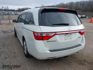 2013 Honda Odyssey Touring with VIN 5FNRL5H96DB089336, listed as a IAAI auction lot 41527990 with 128,770 mi miles. Bid and sale history available at carsss.com. Image 3.