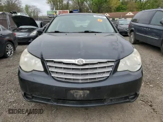 2010 Chrysler Sebring Touring with VIN 1C3CC4FB0AN134875, listed as a Copart auction lot 53635455 with 146,100 mi miles and Salvage Title. Bid and sale history available at DreamBid. Image 5.