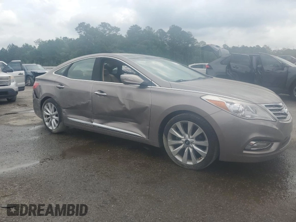 2013 Hyundai Azera z VIN KMHFH4JG1DA285969, wystawiony jako Copart lot #51234205 z przebiegiem 64 342 mil mil oraz Czysty tytuł • Clean title. Historia ofert i sprzedaży dostępna na DreamBid. Obrazek 4.