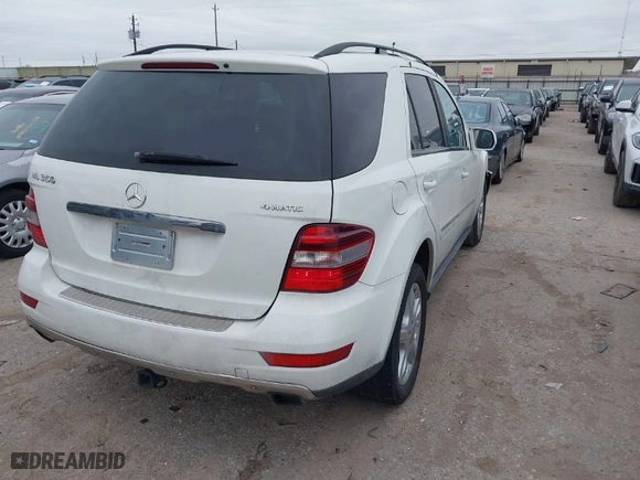 2009 Mercedes-Benz M-Class 3.5L with VIN 4JGBB86E69A445673, listed as a IAAI auction lot 41579434 with 200,449 mi miles. Bid and sale history available at carsss.com. Image 4.