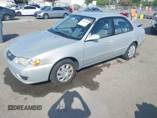 2002 Toyota Corolla CE with VIN 1NXBR12EX2Z637420, listed as a IAAI auction lot 42433300 with 98,353 mi miles and . Bid and sale history available at DreamBid. Image 2.