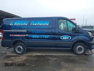 2021 Ford Transit Cargo with VIN 1FTBR1Y80MKA12125, listed as a IAAI auction lot 41773493 with 42,989 mi miles and . Bid and sale history available at DreamBid. Image 13.