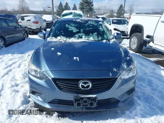 2016 Mazda 6 i Sport with VIN JM1GJ1U5XG1416911, listed as a IAAI auction lot 41562190 with 101,427 mi miles and . Bid and sale history available at DreamBid. Image 13.