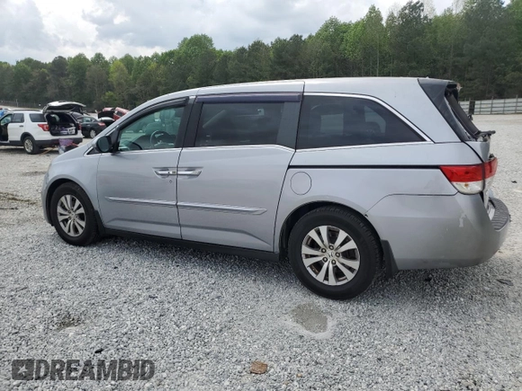 2016 Honda Odyssey EX-L with VIN 5FNRL5H65GB040719, listed as a Copart auction lot 54587295 with 231,302 mi miles and Salvage Title. Bid and sale history available at DreamBid. Image 2.