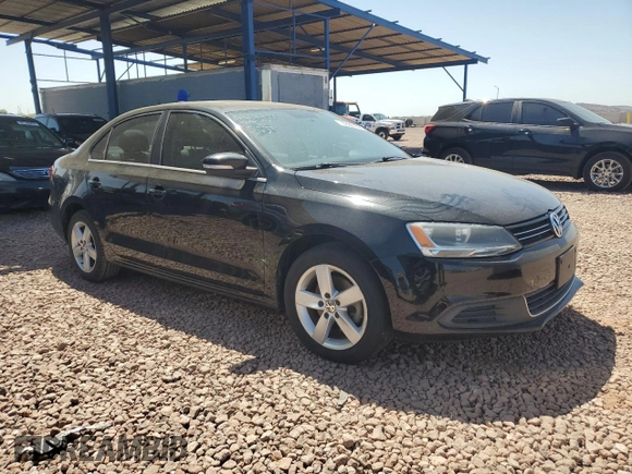 2014 Volkswagen Jetta TDI w/Premium with VIN 3VWLL7AJ8EM402757, listed as a Copart auction lot 52201895 with 99,475 mi miles and Salvage title. Bid and sale history available at DreamBid. Image 4.