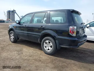 2007 Honda Pilot LX with VIN 5FNYF28117B044692, listed as a IAAI auction lot 42081205 with 173,744 mi miles. Bid and sale history available at carsss.com. Image 3.