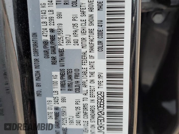 2019 Mazda CX-5 Grand Touring with VIN JM3KFBDM2K0569829, listed as a Copart auction lot 59060965 with 99,359 mi miles and Salvage title. Bid and sale history available at DreamBid. Image 13.
