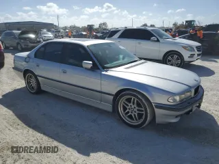 2000 BMW 7 Series 740iA with VIN WBAGG8349YDN79868, listed as a Copart auction lot 76798734 with 0 mi miles and Salvage Title. Bid and sale history available at carsss.com. Image 4.