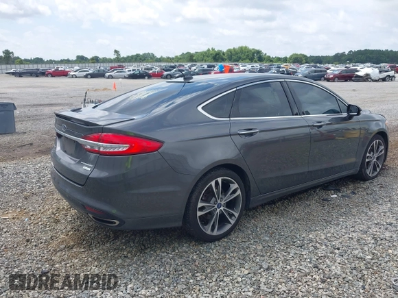 2017 Ford Fusion Titanium with VIN 3FA6P0K98HR363360, listed as a IAAI auction lot 42461432 with 182,807 mi miles and . Bid and sale history available at DreamBid. Image 4.