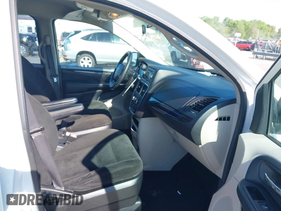 2015 Dodge Grand Caravan SE with VIN 2C4RDGBGXFR569435, listed as a IAAI auction lot 42057084 with 160,058 mi miles and . Bid and sale history available at DreamBid. Image 5.