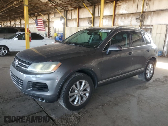 2013 Volkswagen Touareg Lux с VIN WVGEF9BP9DD003735, выставлен на аукционе Copart как лот 58852315 с пробегом 138 223 миль миль и Списание • Salvage title. История ставок и продаж доступна на DreamBid. Изображение 1.