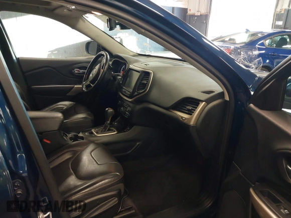2018 Jeep Cherokee Limited with VIN 1C4PJMDXXJD611125, listed as a IAAI auction lot 41811985 with 148,956 mi miles. Bid and sale history available at carsss.com. Image 5.