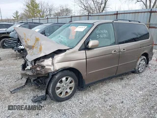 2004 Honda Odyssey EX z VIN 5FNRL18634B004127, wystawiony jako IAAI lot #41854878 z przebiegiem 242 601 mil mil oraz . Historia ofert i sprzedaży dostępna na DreamBid. Obrazek 17.