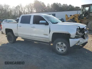 2016 Chevrolet Silverado 1500 High Country with VIN 3GCUKTEC0GG227100, listed as a Copart auction lot 48562765 with 146,466 mi miles and Salvage Title. Bid and sale history available at DreamBid. Image 4.