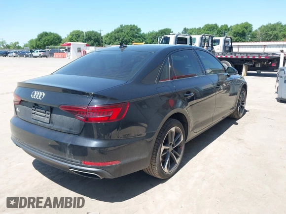 2019 Audi A4 Premium z VIN WAUGMAF49KN014940, wystawiony jako IAAI lot #41962088 z przebiegiem 69 099 mil mil oraz . Historia ofert i sprzedaży dostępna na DreamBid. Obrazek 4.
