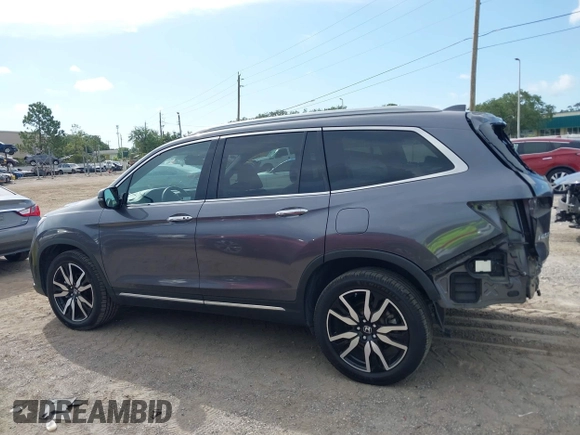 2022 Honda Pilot Elite with VIN 5FNYF6H04NB025212, listed as a IAAI auction lot 42430032 with 69,427 mi miles and . Bid and sale history available at DreamBid. Image 14.