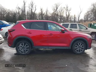 2018 Mazda CX-5 Grand Touring with VIN JM3KFBDM8J0406276, listed as a IAAI auction lot 41447355 with 70,772 mi miles. Bid and sale history available at carsss.com. Image 13.