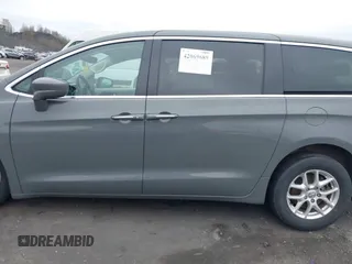 2020 Chrysler Pacifica Touring with VIN 2C4RC1FG3LR245765, listed as a IAAI auction lot 42069689 with 40,869 mi miles and . Bid and sale history available at DreamBid. Image 14.