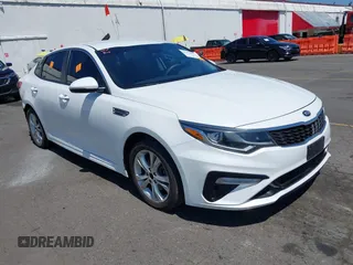 2020 Kia Optima LX with VIN 5XXGT4L36LG390639, listed as a IAAI auction lot 42370255 with 55,145 mi miles and . Bid and sale history available at DreamBid. Image 1.