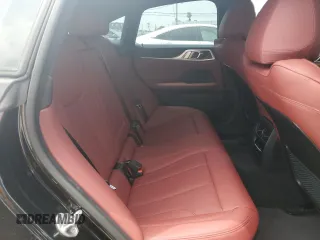 2024 BMW i4 eDrive35 with VIN WBY43AW02RFT03098, listed as a Copart auction lot 57317884 with 203 mi miles and Salvage Title. Bid and sale history available at carsss.com. Image 10.
