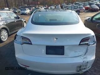 2021 Tesla Model 3 Long Range with VIN 5YJ3E1EB1MF056759, listed as a IAAI auction lot 41464108 with 48,694 mi miles and . Bid and sale history available at carsss.com. Image 16.