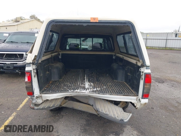 2004 Nissan Frontier XE with VIN 1N6DD26T54C403203, listed as a IAAI auction lot 41658314 with 203,648 mi miles and . Bid and sale history available at DreamBid. Image 17.