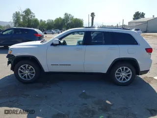 2021 Jeep Grand Cherokee Laredo X with VIN 1C4RJEAG3MC714500, listed as a IAAI auction lot 41637602 with 71,537 mi miles. Bid and sale history available at carsss.com. Image 15.