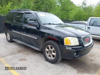 2005 GMC Envoy XL SLE with VIN 1GKET16S156114805, listed as a IAAI auction lot 42163519 with 168,584 mi miles. Bid and sale history available at carsss.com. Image 1.