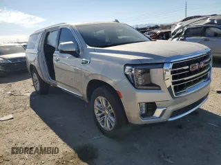 2021 GMC Yukon XL SLT with VIN 1GKS2GKD7MR421859, listed as a Copart auction lot 82650854 with 85,775 mi miles and Salvage Title. Bid and sale history available at carsss.com. Image 4.