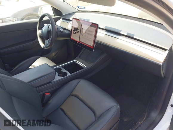 2021 Tesla Model Y Long Range with VIN 5YJYGDEE0MF265339, listed as a IAAI auction lot 41975058 with 51,292 mi miles and . Bid and sale history available at DreamBid. Image 5.