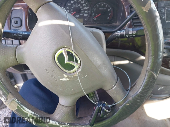 2000 Mazda MPV DX with VIN JM3LW28G8Y0125047, listed as a IAAI auction lot 42305890 with 214,647 mi miles and . Bid and sale history available at DreamBid. Image 11.