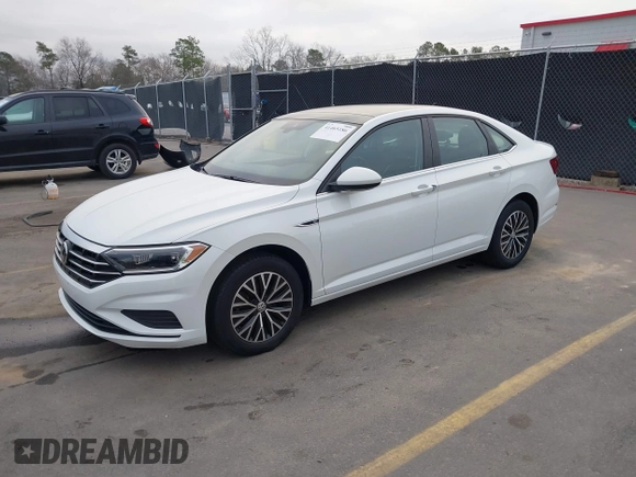 2019 Volkswagen Jetta SEL z VIN 3VWE57BU4KM248989, wystawiony jako IAAI lot #41465186 z przebiegiem 41 985 mil mil oraz . Historia ofert i sprzedaży dostępna na DreamBid. Obrazek 17.