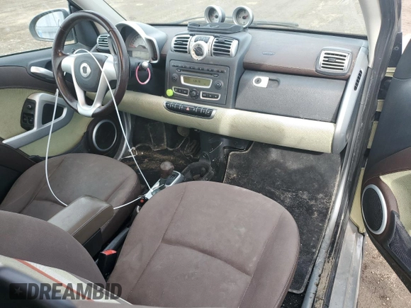 2009 Smart fortwo Pure z VIN WMEEJ31X49K292142, wystawiony jako Copart lot #48928535 z przebiegiem 226 263 mil mil oraz Tytuł czysty. Historia ofert i sprzedaży dostępna na DreamBid. Obrazek 8.