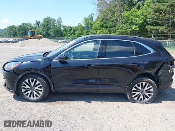 2020 Ford Escape Titanium with VIN 1FMCU9J92LUA27373, listed as a IAAI auction lot 42650077 with 42,179 mi miles and . Bid and sale history available at DreamBid. Image 15.