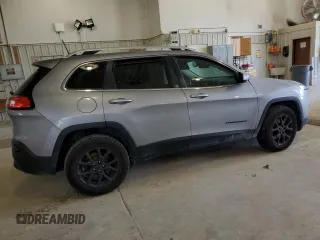 2016 Jeep Cherokee Latitude with VIN 1C4PJMCSXGW180482, listed as a Copart auction lot 60639315 with 118,164 mi miles and Salvage title. Bid and sale history available at DreamBid. Image 3.