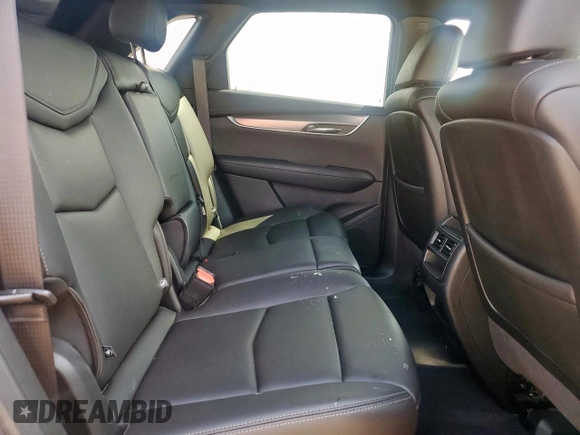 2021 Cadillac XT5 AWD Luxury z VIN 1GYKNBR44MZ162883, wystawiony jako Copart lot #59623725 z przebiegiem 50 006 mil mil oraz Szkoda całkowita • Salvage title. Historia ofert i sprzedaży dostępna na DreamBid. Obrazek 11.