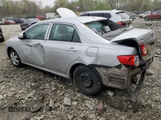 2009 Toyota Corolla with VIN 1NXBU40E89Z031322, listed as a Copart auction lot 52397465 with 198,046 mi miles and Salvage Title. Bid and sale history available at carsss.com. Image 2.