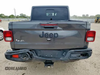 2021 Jeep Gladiator Willys с VIN 1C6HJTAG9ML606731, выставлен на аукционе Copart как лот 59873205 с пробегом 84 811 миль миль и Списание • Salvage title. История ставок и продаж доступна на DreamBid. Изображение 6.