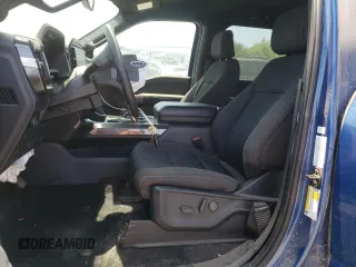 2023 Ford F-150 XL with VIN 1FTFW1E8XPKE23518, listed as a Copart auction lot 60340975 with 11,661 mi miles and Salvage title. Bid and sale history available at DreamBid. Image 7.