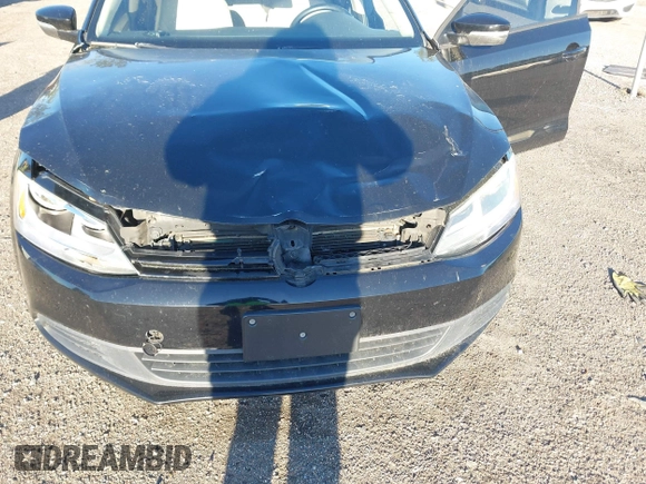 2012 Volkswagen Jetta Sedan TDI with VIN 3VW3L7AJ0CM409148, listed as a IAAI auction lot 41796513 with 167,269 mi miles. Bid and sale history available at carsss.com. Image 6.