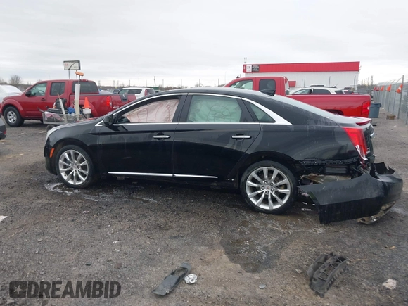 2015 Cadillac XTS Luxury with VIN 2G61M5S38F9138545, listed as a IAAI auction lot 41690696 with 136,460 mi miles and . Bid and sale history available at DreamBid. Image 14.