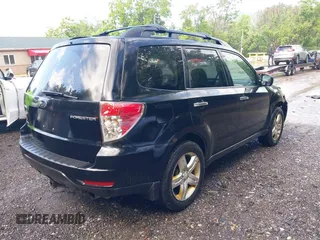 2009 Subaru Forester X with VIN JF2SH63619H738409, listed as a IAAI auction lot 42428672 with 190,636 mi miles and . Bid and sale history available at DreamBid. Image 4.