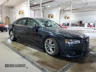 2016 Audi A8 Sport с VIN WAU43AFDXGN004897, выставлен на аукционе Copart как лот 63614425 с пробегом Не указан миль и Списание • Salvage title. История ставок и продаж доступна на DreamBid. Изображение 4.
